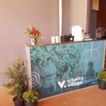 mobile bar with custom signage for Vitality Village